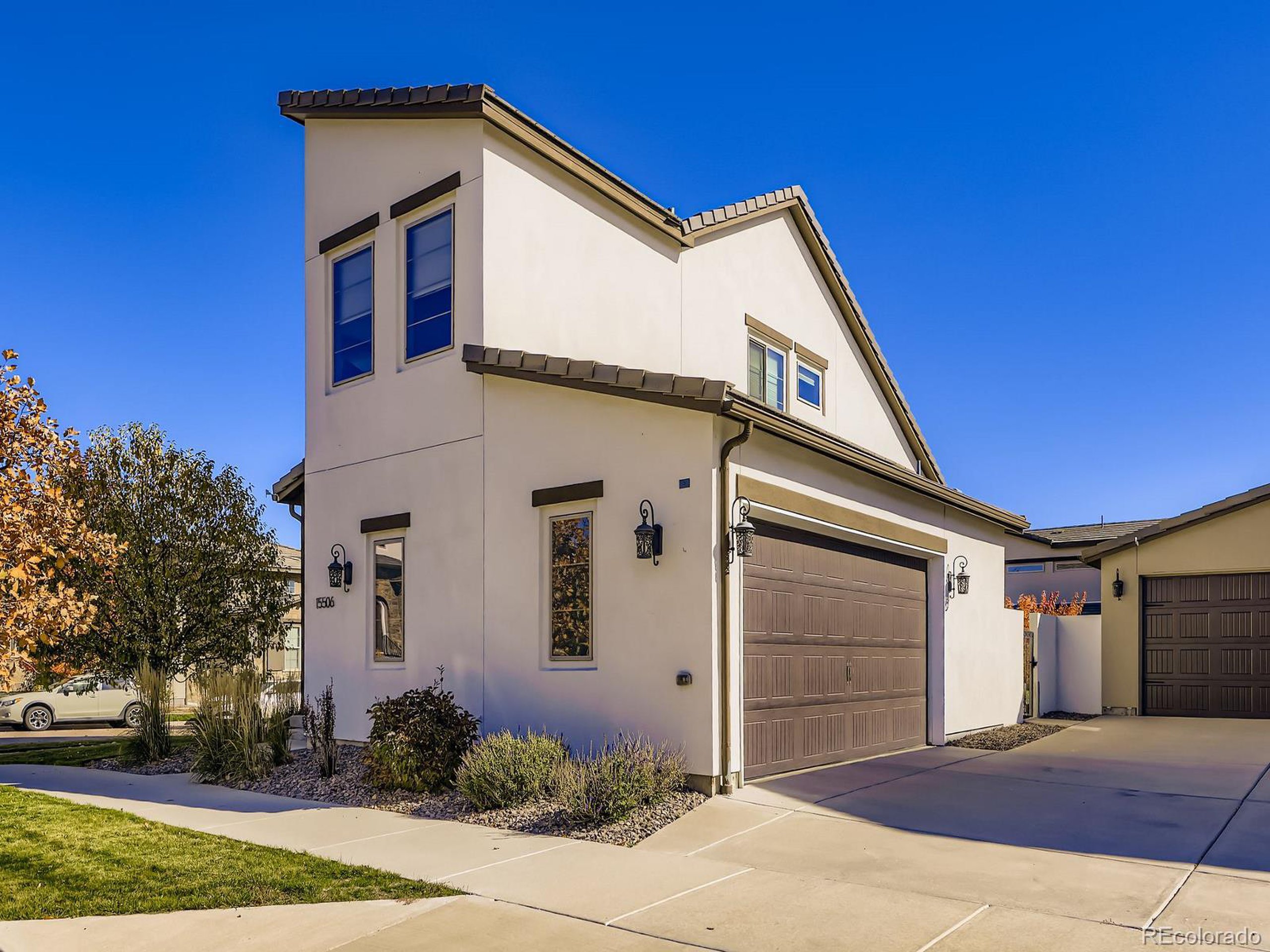 15506 W Lane Lakewood, CO 80228 - Photo 36 of 37 a front view of a house with a yard