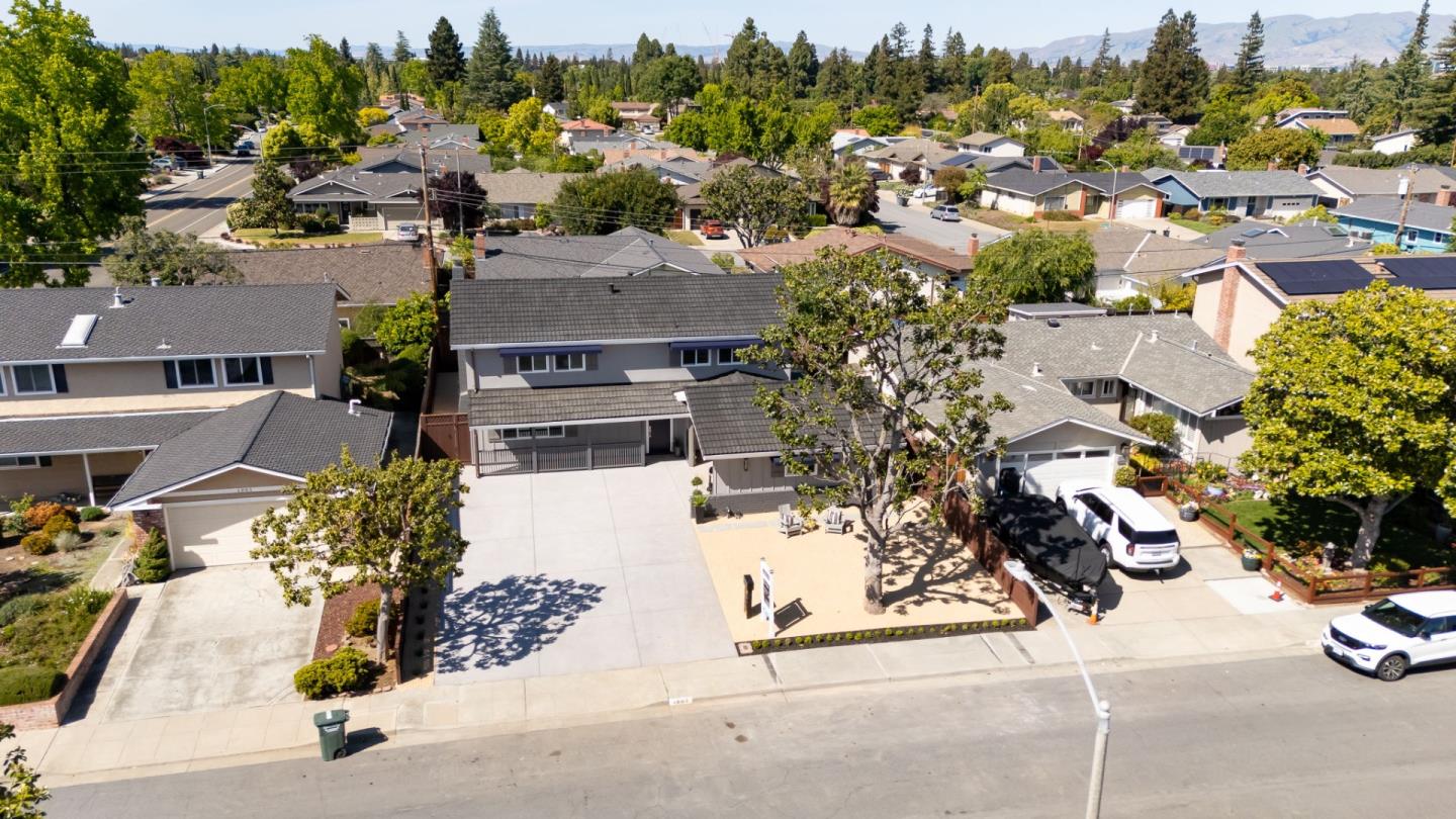 1003 Rosa Avenue Sunnyvale, CA 94086 - Photo 64 of 68 an aerial view of residential houses and car parked on street side