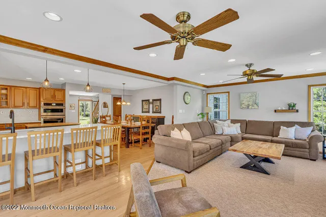 a bedroom with a large bed and a large window