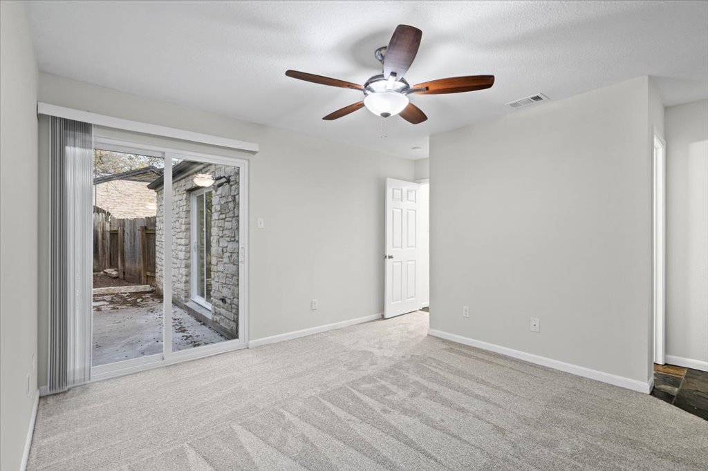 361 Fantail Loop, Unit B Austin, TX 78734 - Photo 21 of 29 a view of a livingroom with a ceiling fan