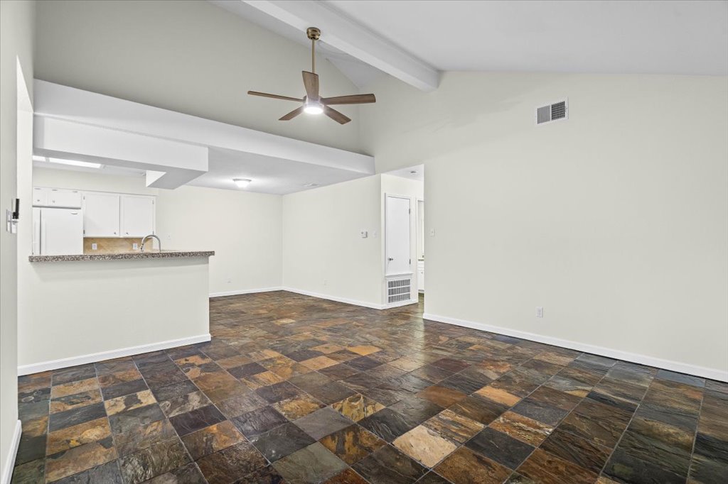 361 Fantail Loop, Unit B Austin, TX 78734 - Photo 9 of 29 a view of a kitchen with a sink and cabinets