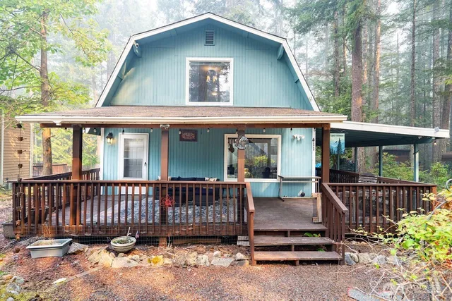 a view of a house with a roof deck
