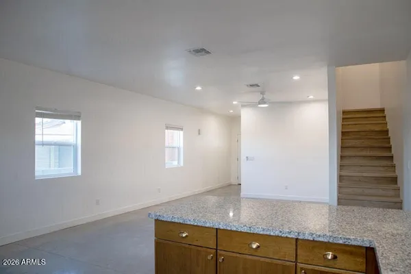 a view of a storage and utility room with window