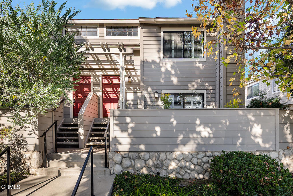 a front view of house with a yard