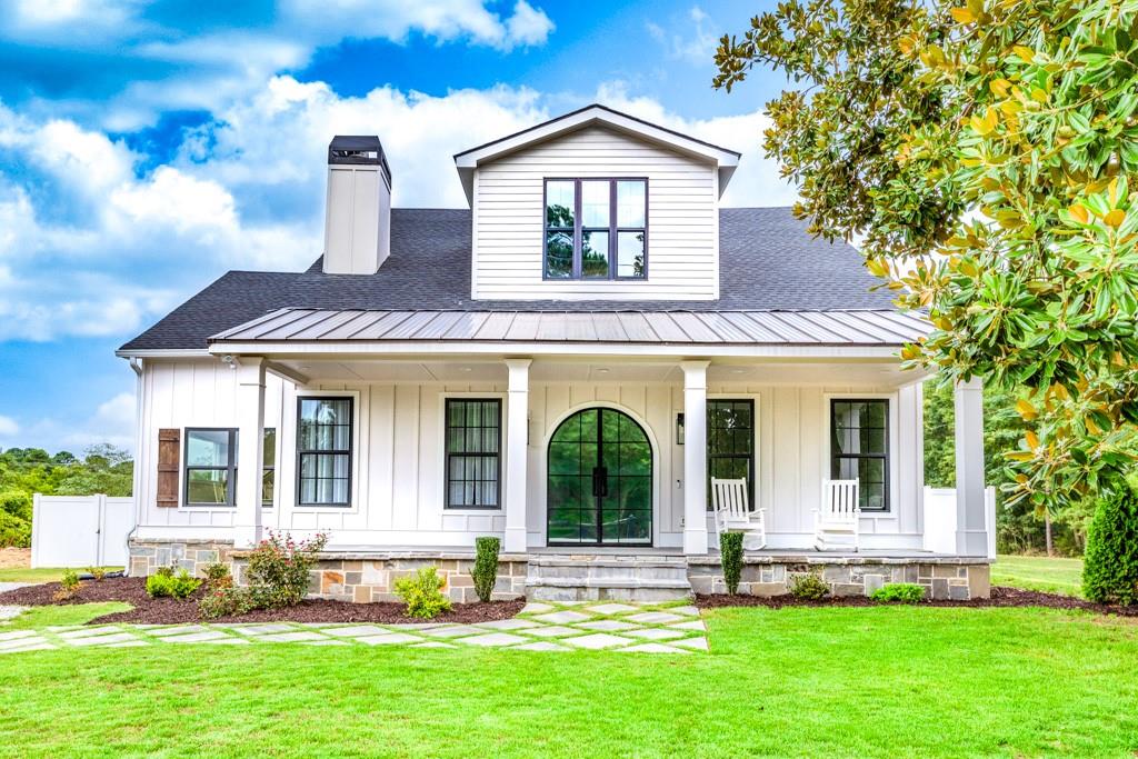 827 Arch Tanner Road Bethlehem, GA 30620 - Photo 1 of 1 a front view of a house with a yard