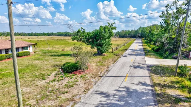 a view of an ocean with swimming pool