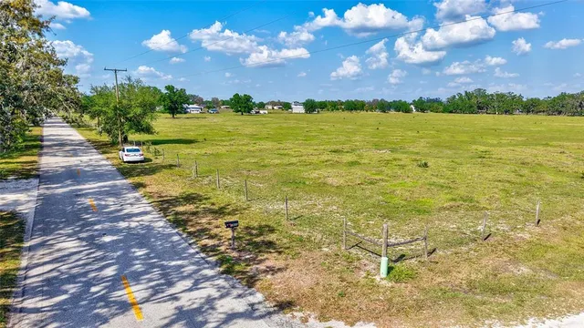 a view of a lake with a building in the background