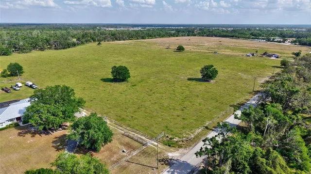 a view of a lake with a building in the background