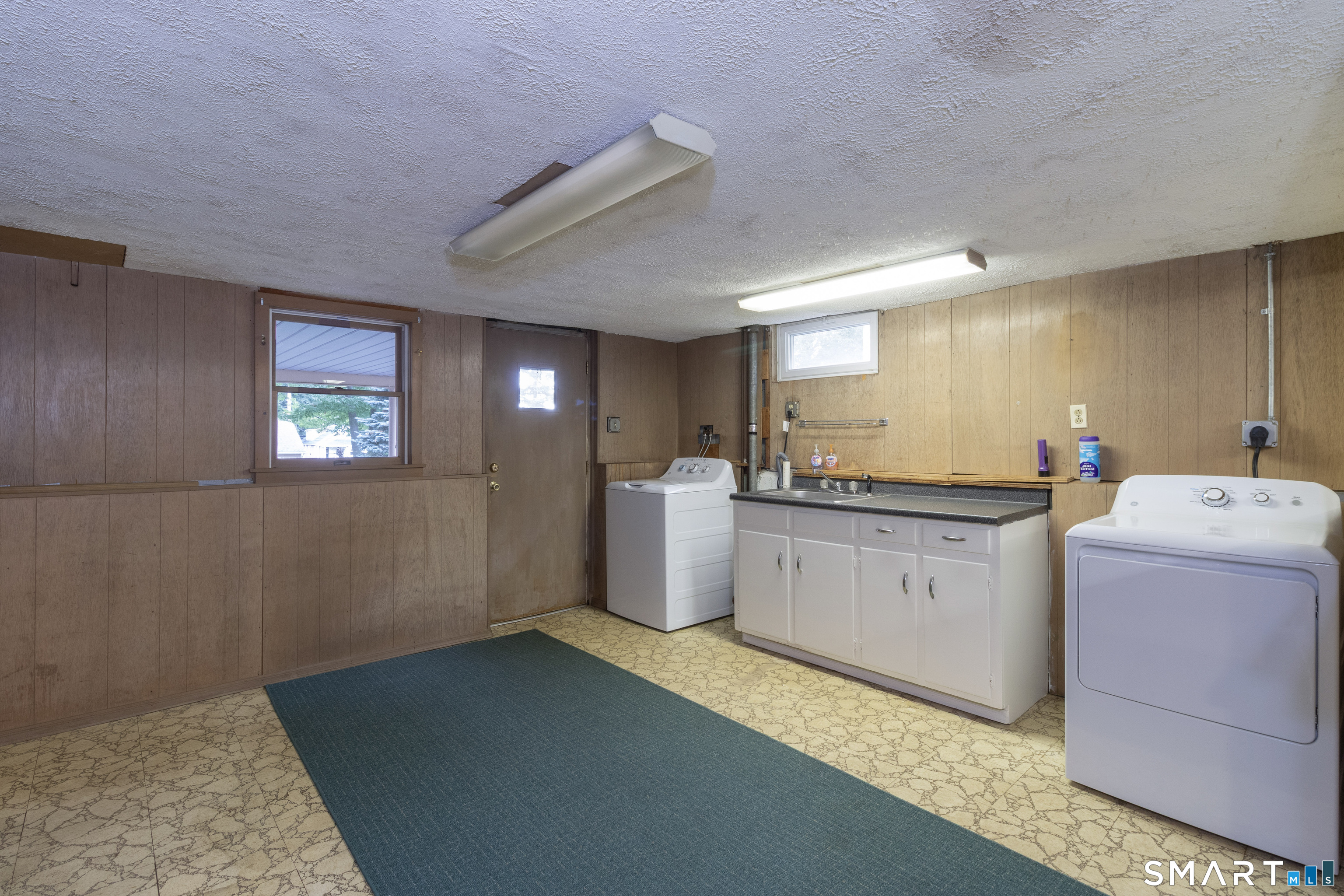 17 Honor Road West Haven, CT 06516 - Photo 31 of 40 Laundry area in the (walkout) finished basement