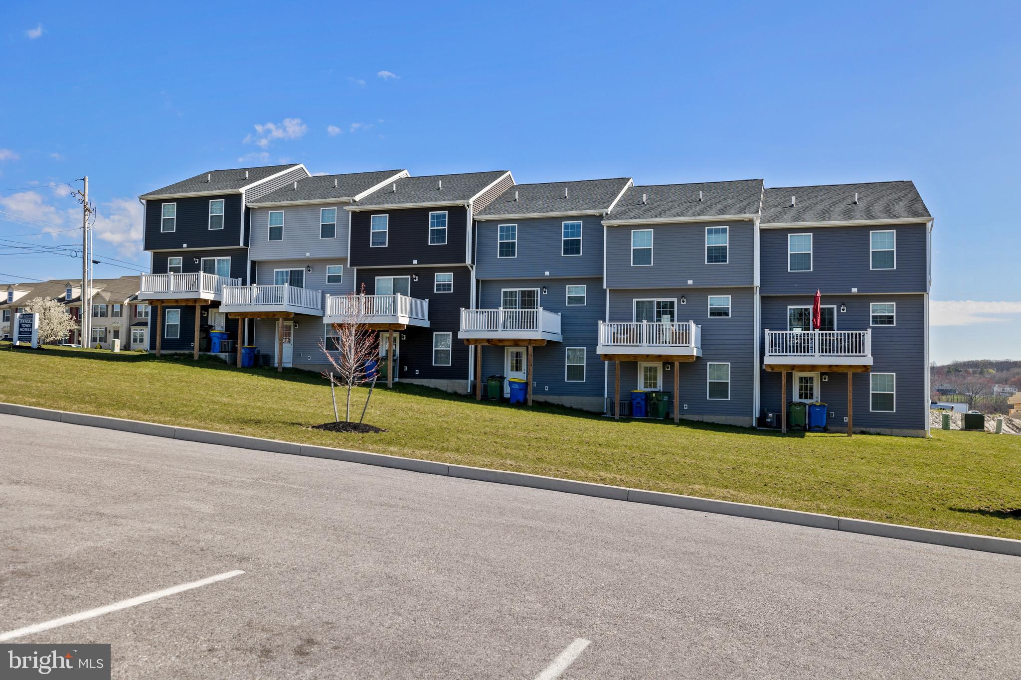 824 Rising Sun Lane Chambersburg, PA 17202 - Photo 25 of 25 a view of an buildings with a big yard and large trees