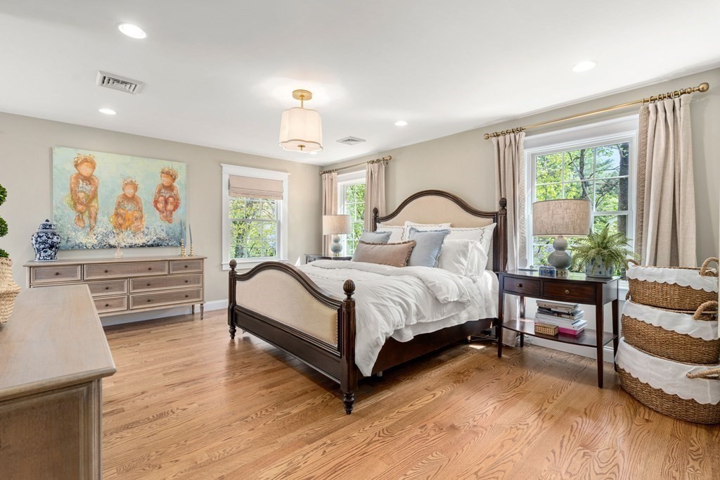 3 Colby Road Wellesley, MA 02482 - Photo 12 of 25 a bedroom with a bed painting on wall and a large window