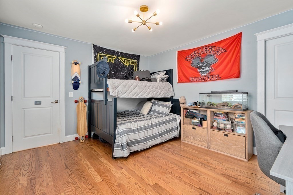 3 Colby Road Wellesley, MA 02482 - Photo 18 of 25 a bedroom with furniture and a ceiling fan