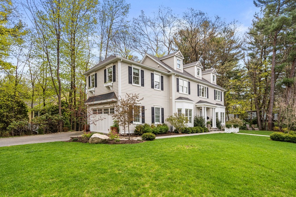 3 Colby Road Wellesley, MA 02482 - Photo 25 of 25 a front view of a house with a garden