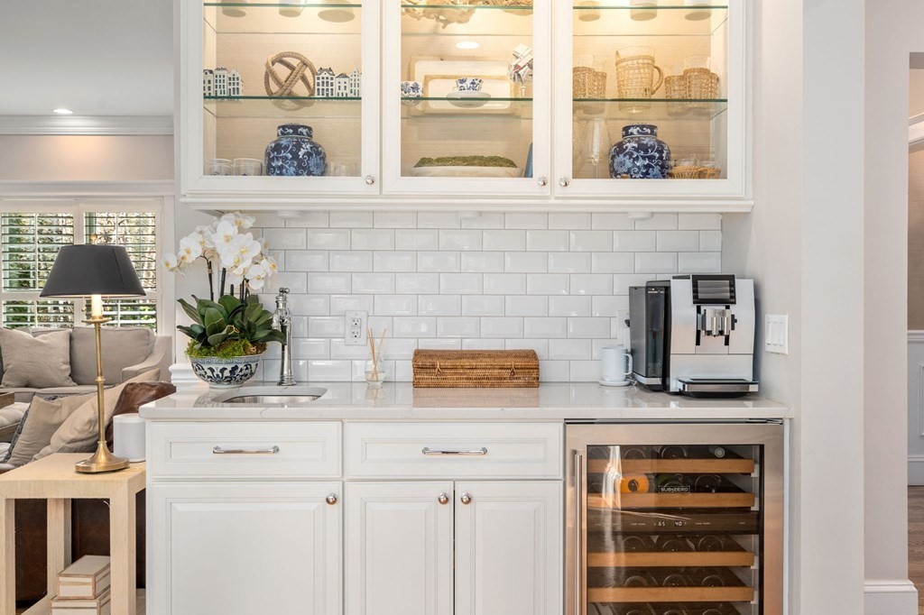 3 Colby Road Wellesley, MA 02482 - Photo 6 of 25 a kitchen with a sink and a potted plant