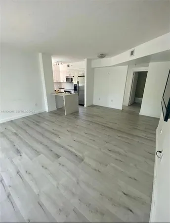 a view of a livingroom with a furniture