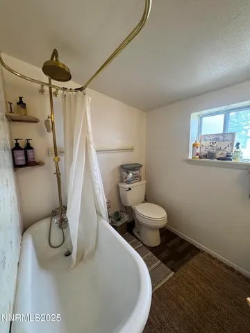 a bathroom with a sink and a toilet