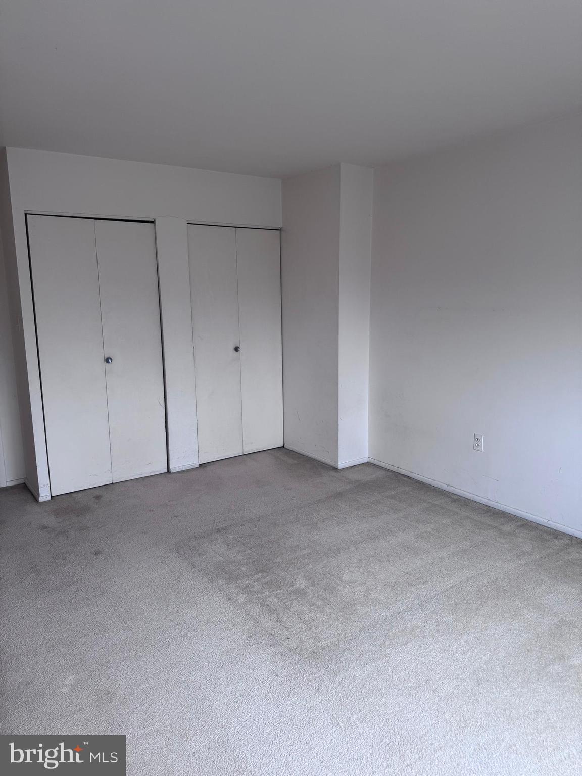 1111 University Boulevard West, Unit 402 Silver Spring, MD 20902 - Photo 13 of 15 a view of an empty room and entryway