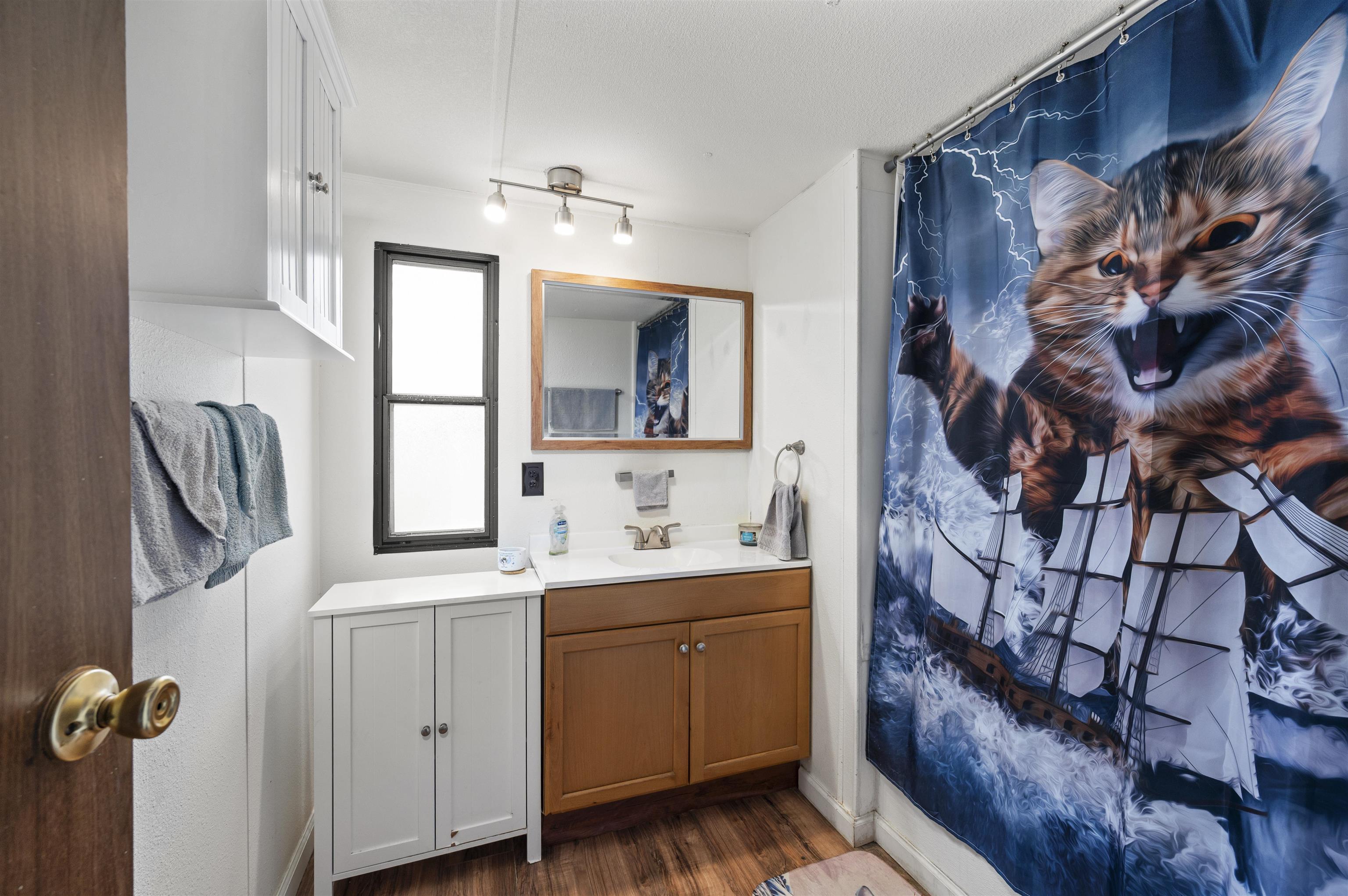 424 32 Road, Unit 6 Clifton, CO 81520 - Photo 11 of 16 a bathroom with a sink and a mirror