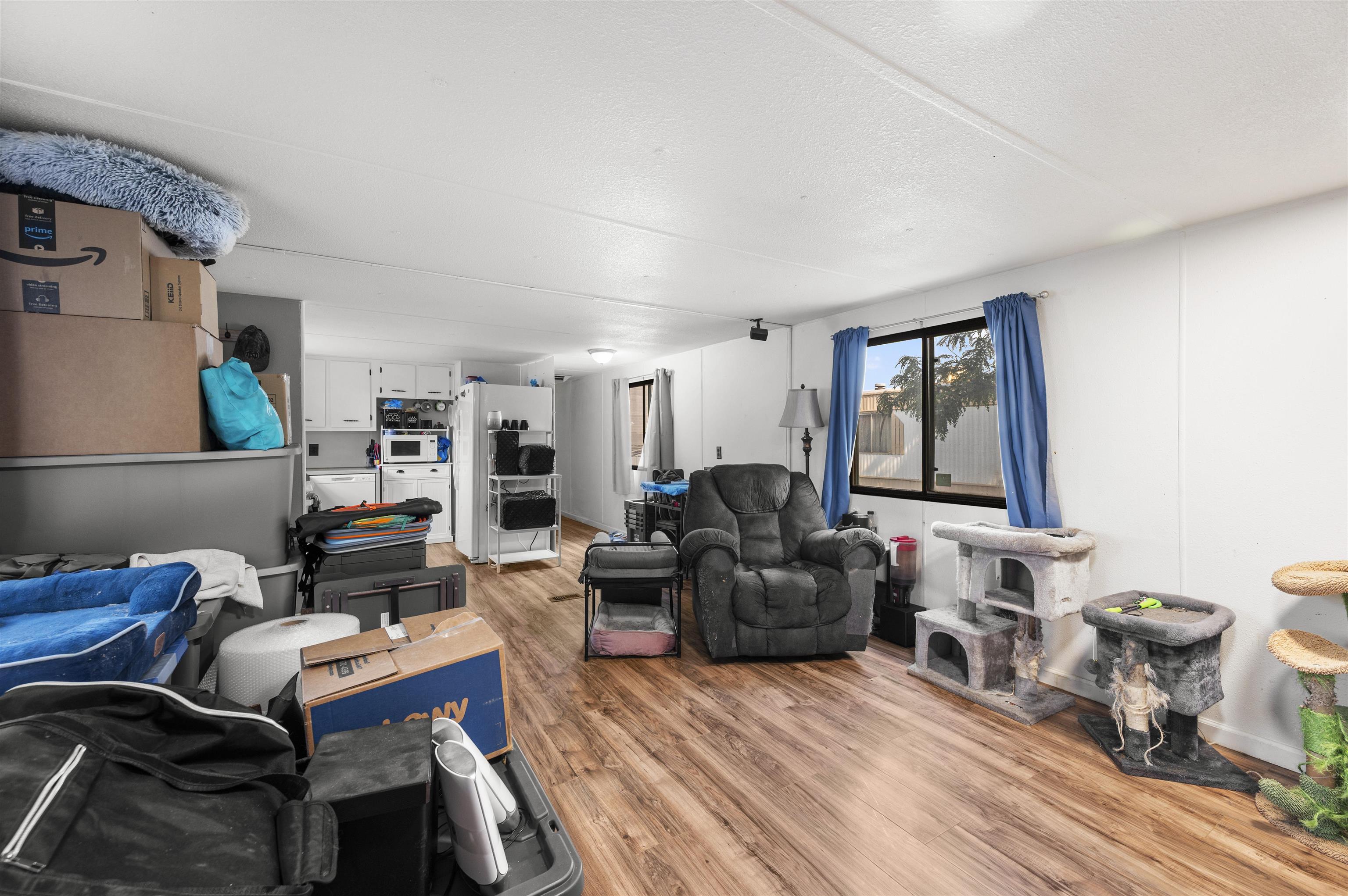 424 32 Road, Unit 6 Clifton, CO 81520 - Photo 7 of 16 a living room with furniture or couch and a window