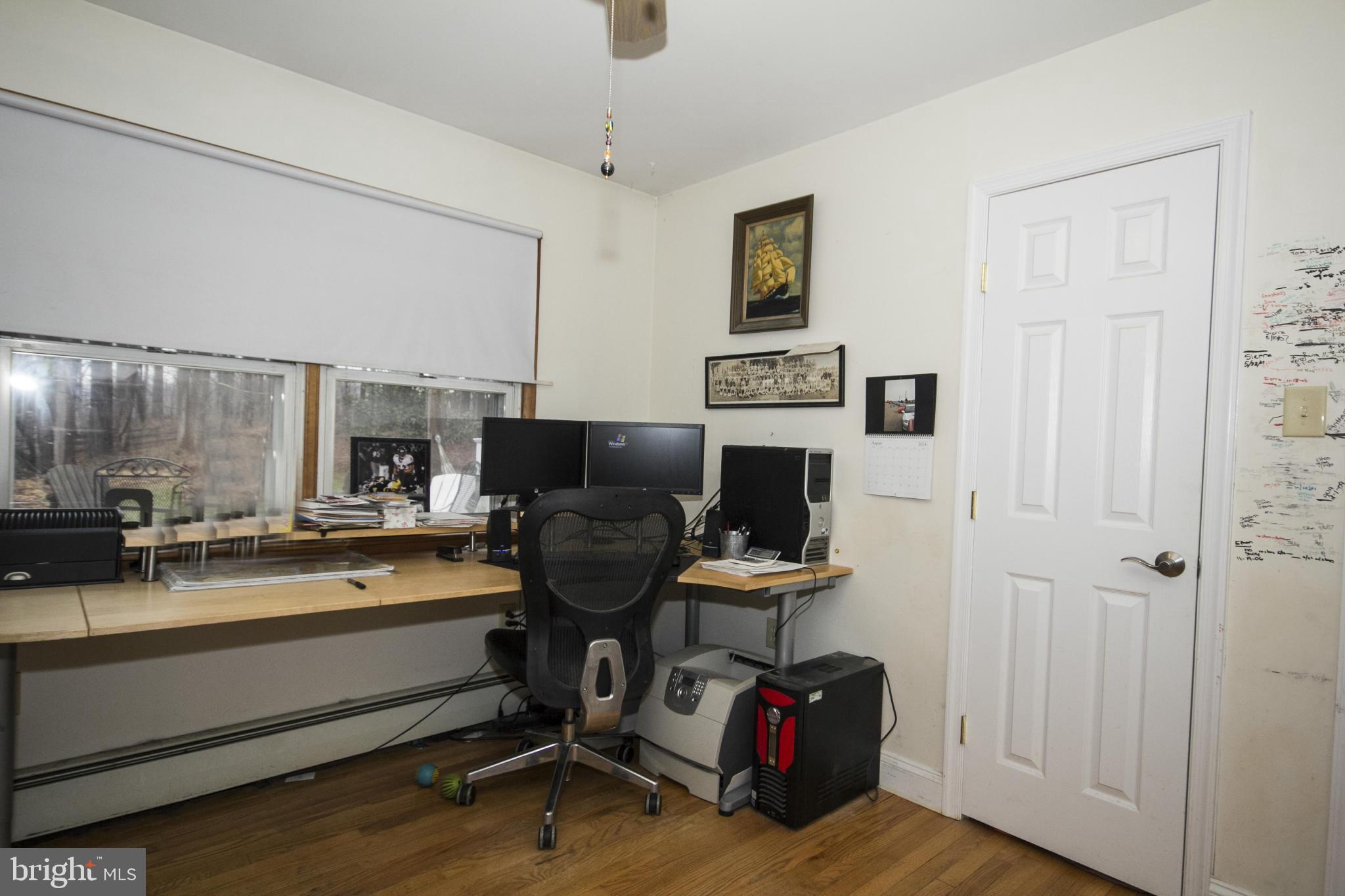 5024 Kemp Road Reisterstown, MD 21136 - Photo 19 of 30 a workspace with furniture and a gate
