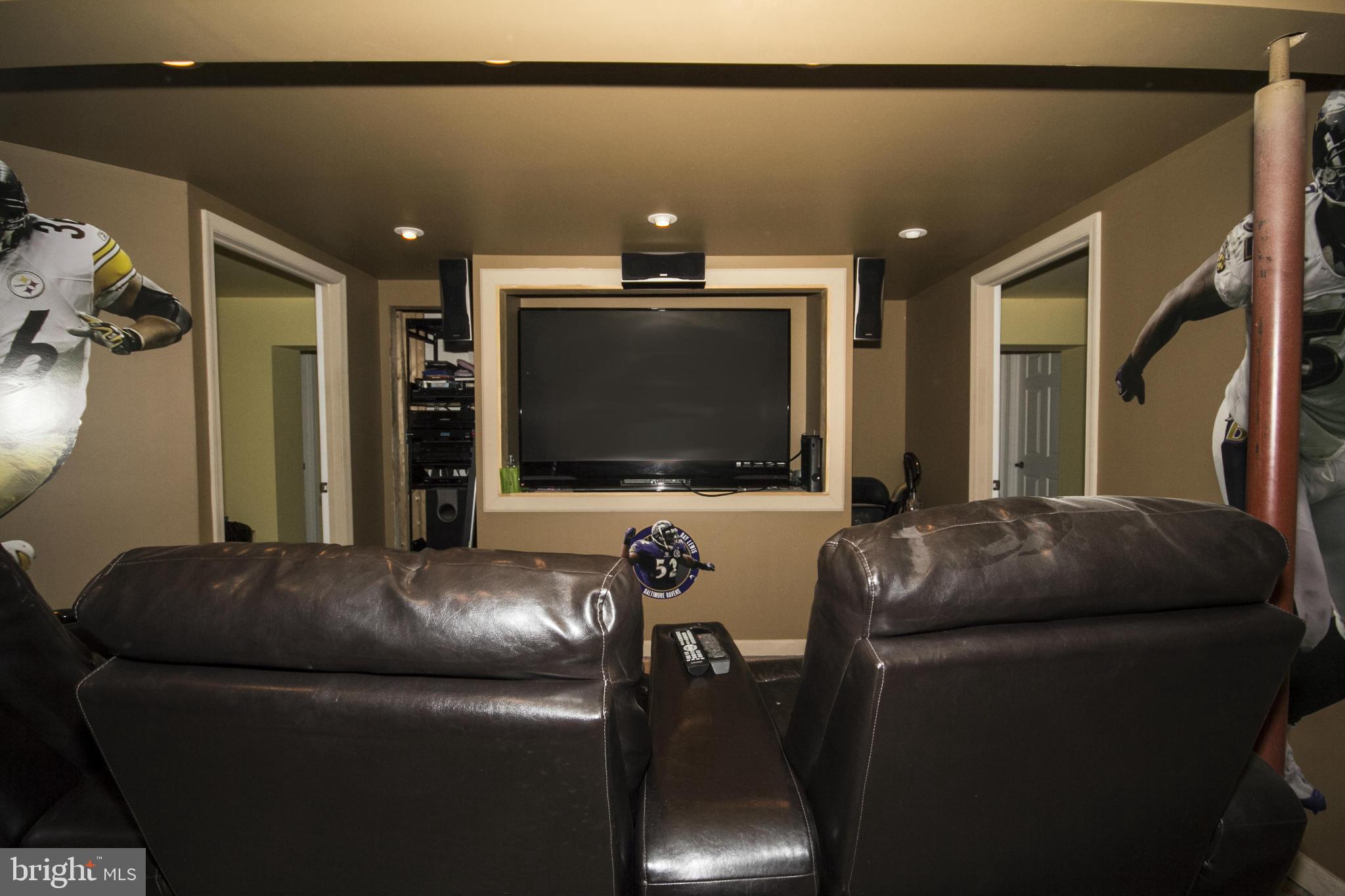 5024 Kemp Road Reisterstown, MD 21136 - Photo 23 of 30 a living room with furniture and a flat screen tv