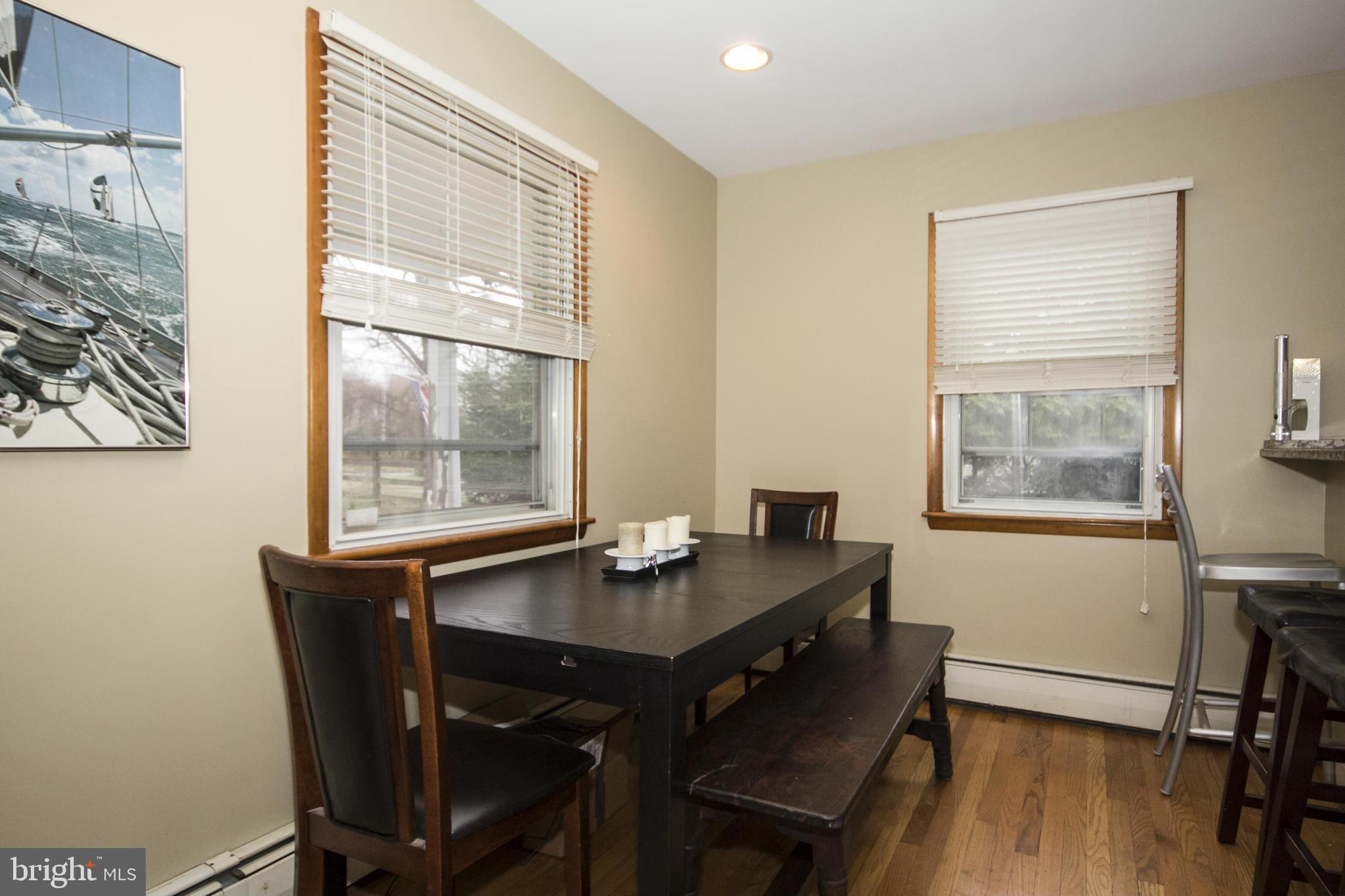 5024 Kemp Road Reisterstown, MD 21136 - Photo 5 of 30 a view of a workspace with furniture and wooden floor