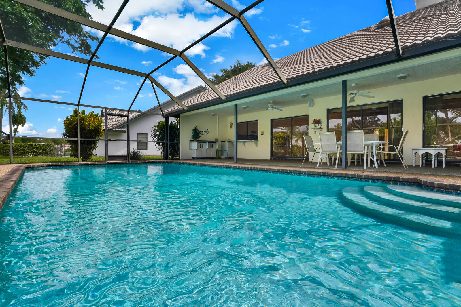 2391 Northwest 38th Street Boca Raton, FL 33431 - Photo 23 of 47 BEAUTIFUL POOL AND PATIO AREA