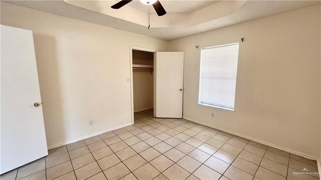 2714 East Mile 4 Road, Unit 23 Mission, TX 78573 - Photo 6 of 10 a view of an empty room and window