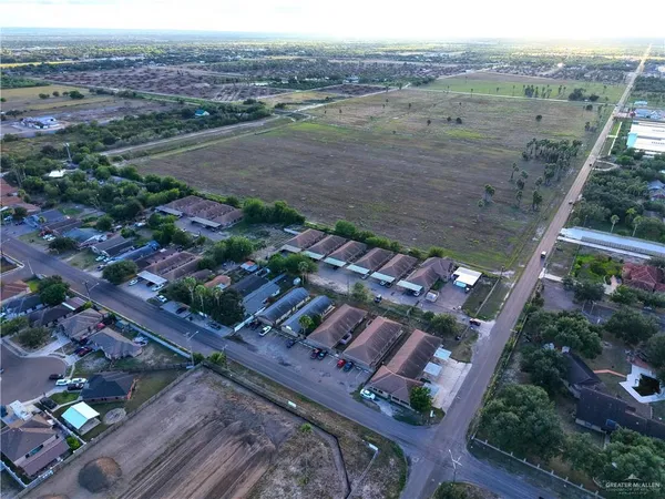 an aerial view of a house with a garden