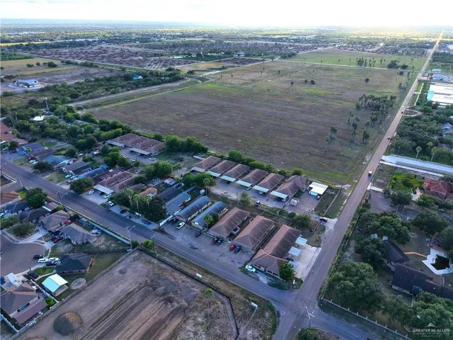 an aerial view of a house with a garden