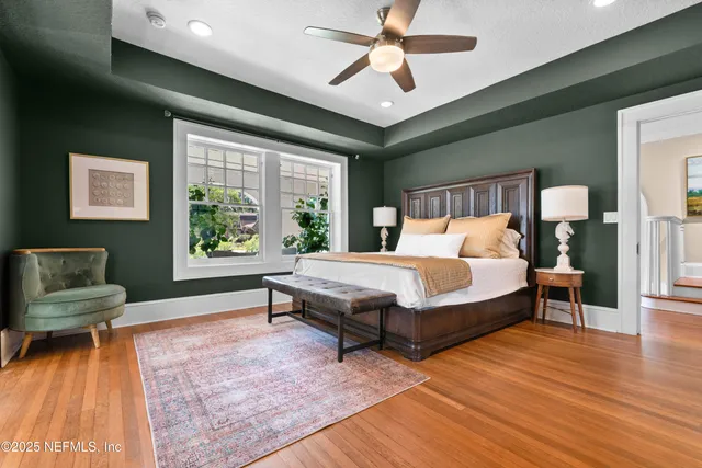 a bed room with a bed and a fireplace