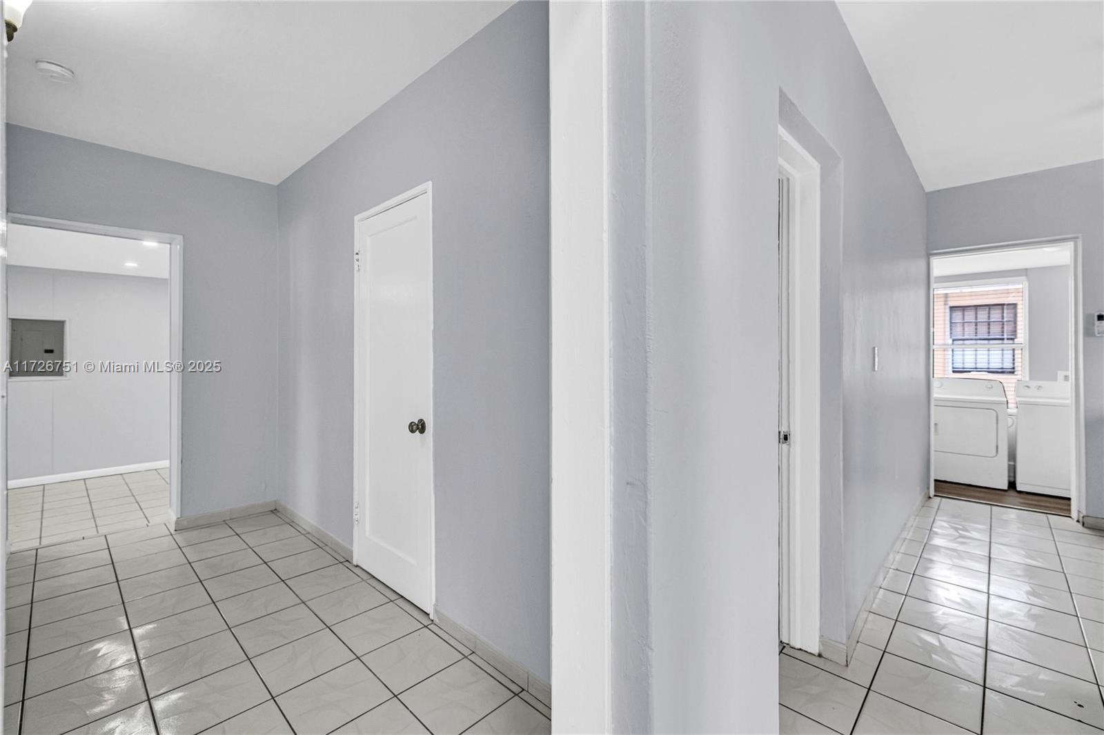 319 Northeast 171 Street North Miami Beach, FL 33162 - Photo 14 of 31 a view of a hallway