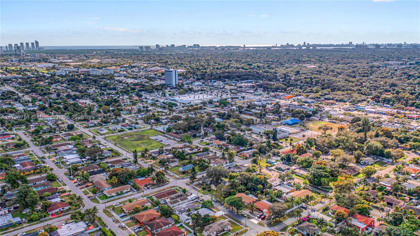 319 Northeast 171 Street North Miami Beach, FL 33162 - Photo 30 of 31 an aerial view of a houses with a swimming pool