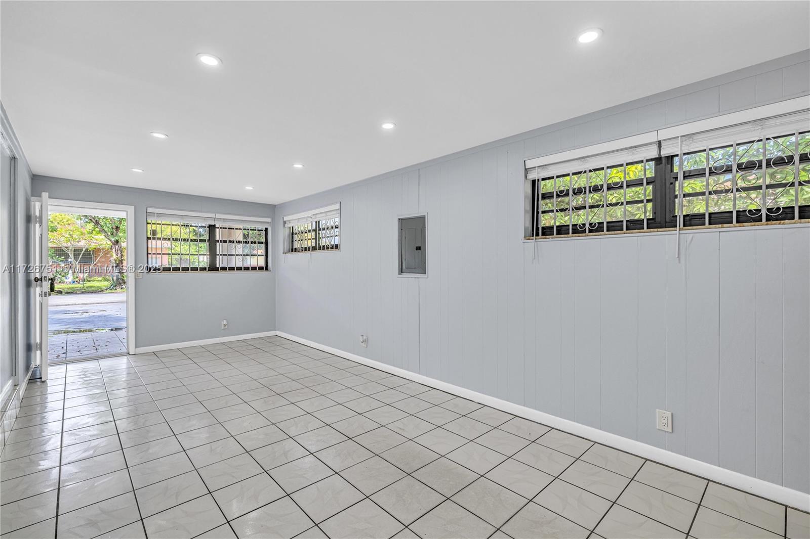 319 Northeast 171 Street North Miami Beach, FL 33162 - Photo 4 of 31 a view of an empty room and window