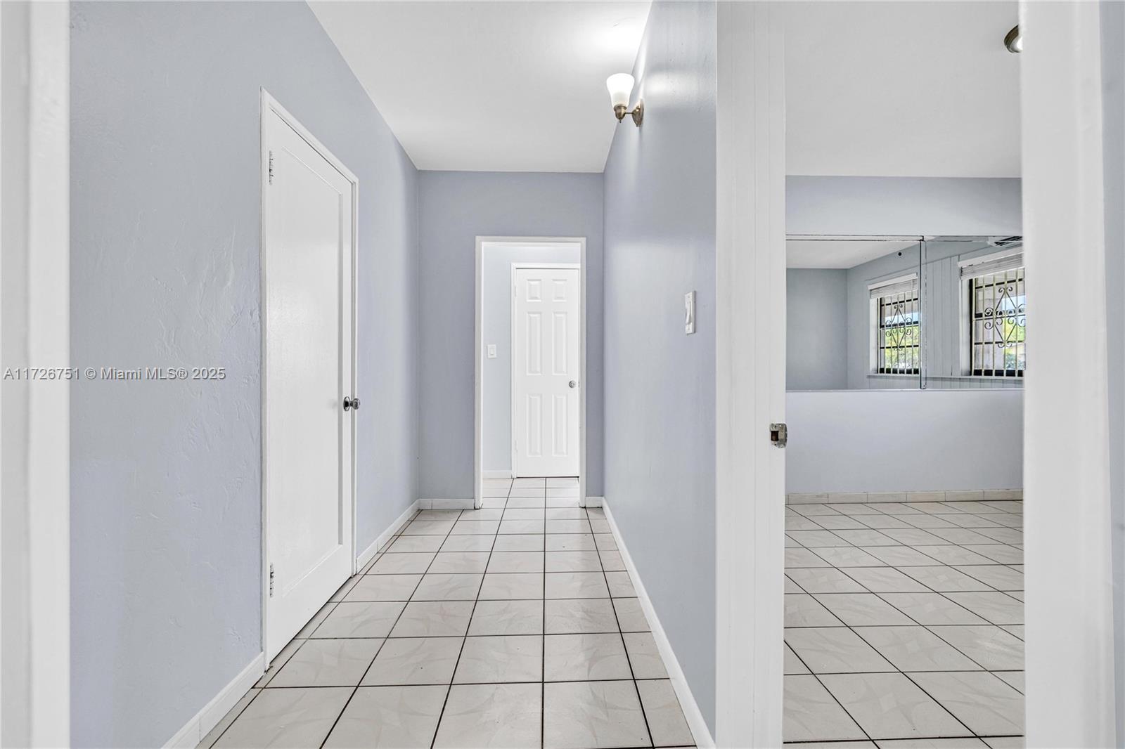 319 Northeast 171 Street North Miami Beach, FL 33162 - Photo 7 of 31 a view of a hallway