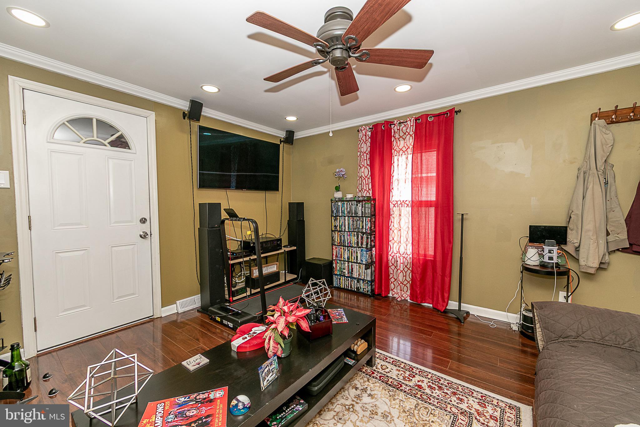 287 Jefferson Street Carneys Point, NJ 08069 - Photo 13 of 31 a living room with furniture and a flat screen tv