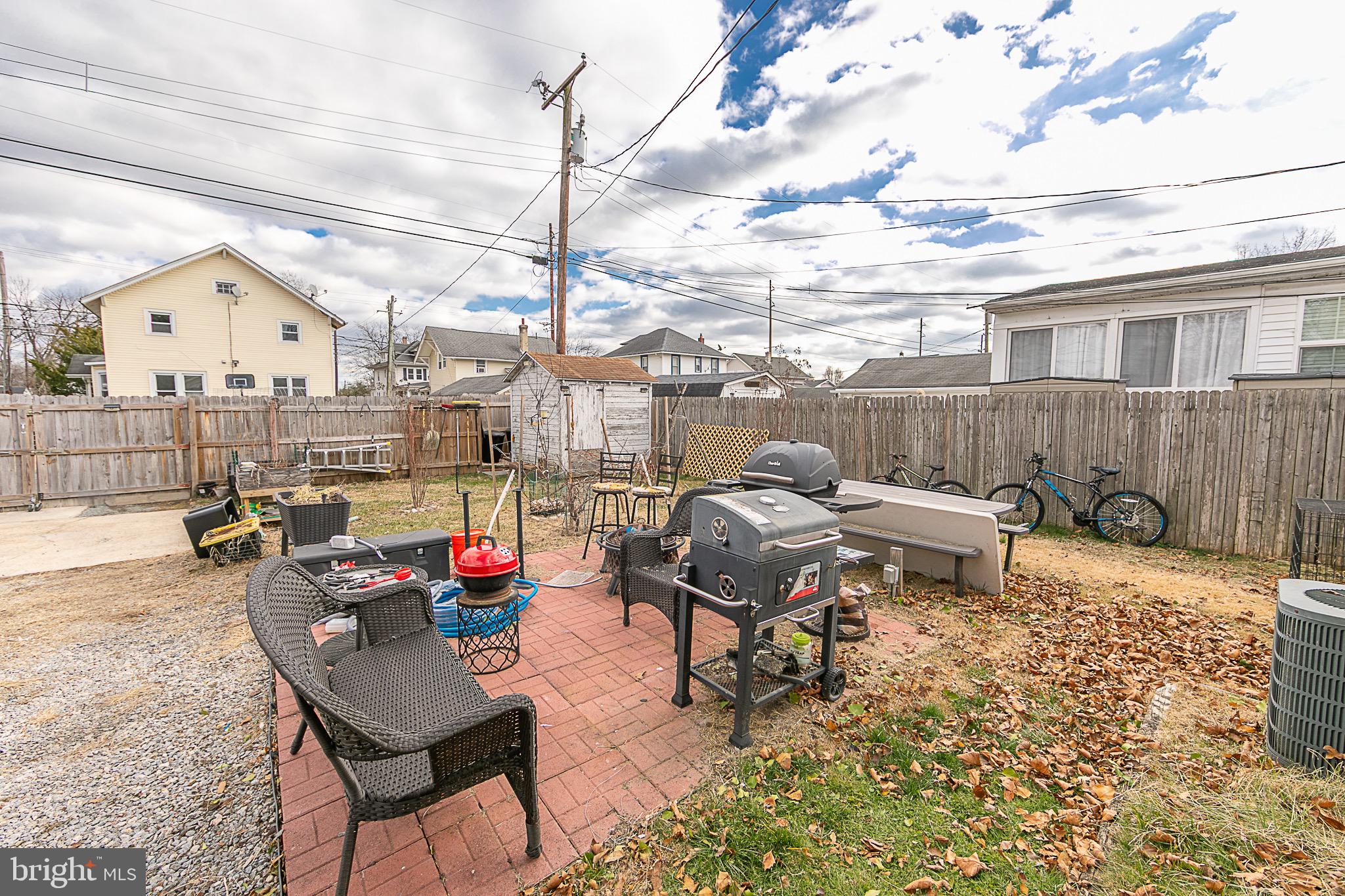 287 Jefferson Street Carneys Point, NJ 08069 - Photo 22 of 31 a roof deck with table and chairs