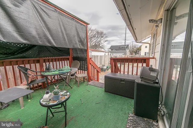 a view of a porch with furniture