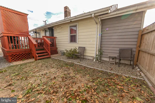 a view of a chairs setting on the deck