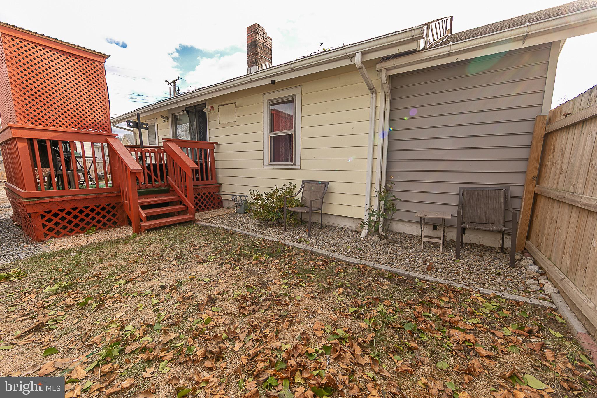 287 Jefferson Street Carneys Point, NJ 08069 - Photo 28 of 31 a view of a house with a yard