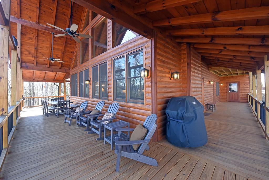 731 Native Trail Cherry Log, GA 30522 - Photo 15 of 54 a view of a chairs and table on wooden floor
