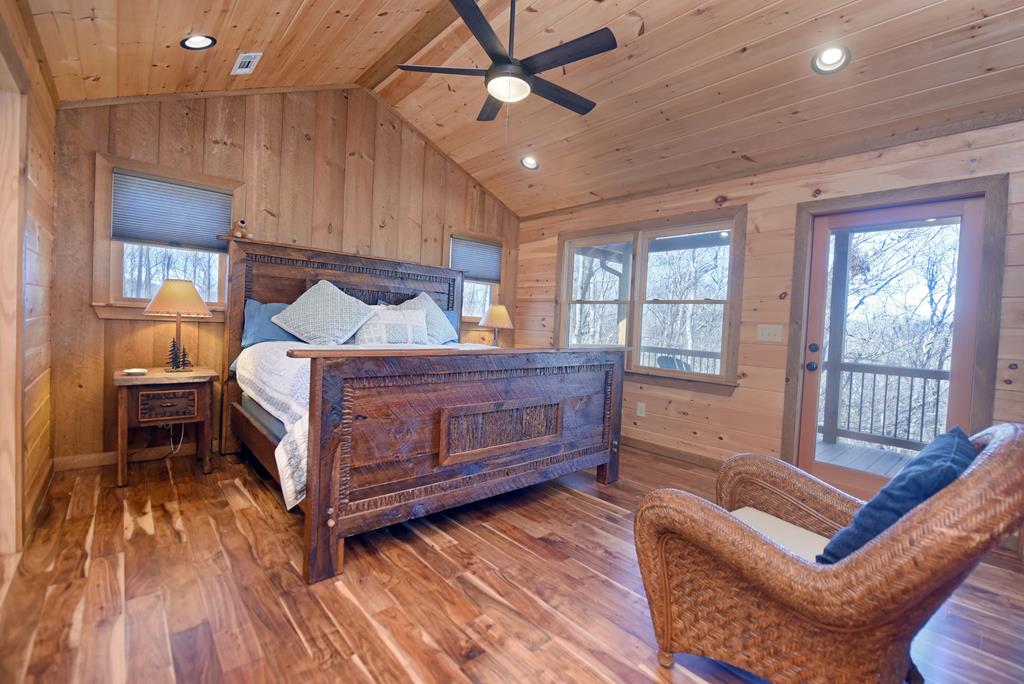 731 Native Trail Cherry Log, GA 30522 - Photo 36 of 54 a bedroom with a bed and wooden floor