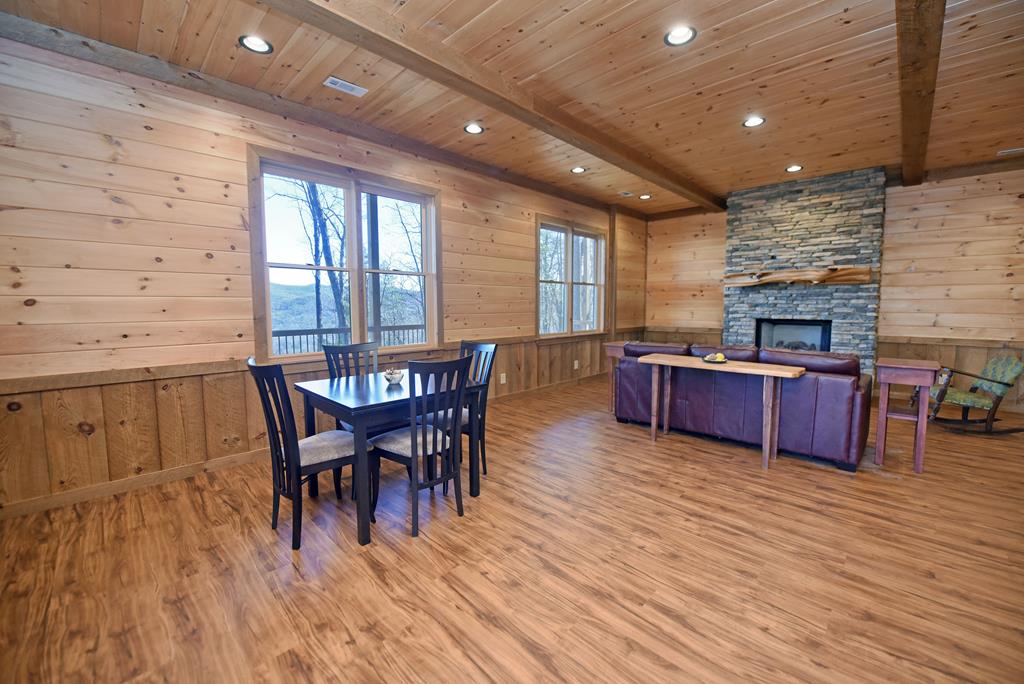 731 Native Trail Cherry Log, GA 30522 - Photo 43 of 54 a view of a dining room with furniture window and wooden floor