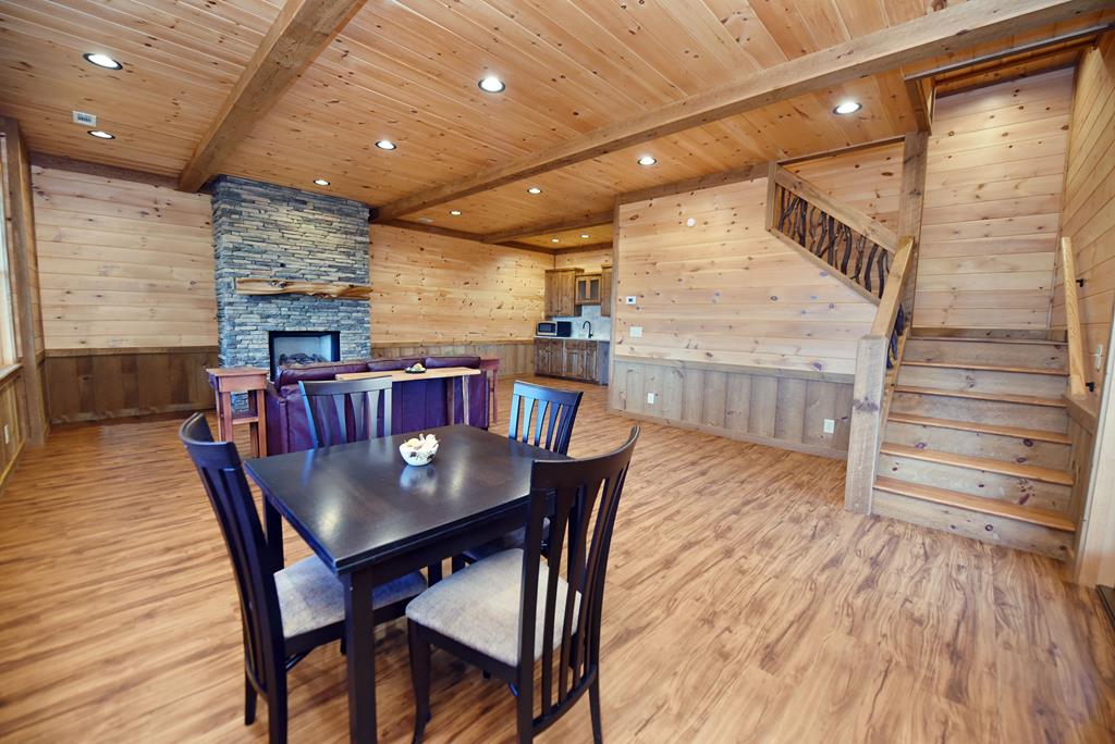 731 Native Trail Cherry Log, GA 30522 - Photo 44 of 54 a view of a dining room with furniture window and wooden floor