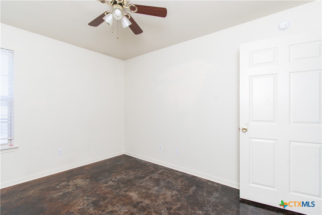 1611 Ute Trail, Unit B Harker Heights, TX 76548 - Photo 12 of 19 a view of empty room with ceiling fan