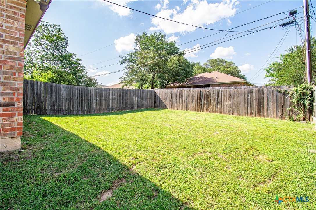 1611 Ute Trail, Unit B Harker Heights, TX 76548 - Photo 19 of 19 a view of a backyard of a house