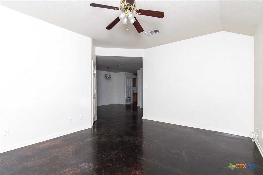 1611 Ute Trail, Unit B Harker Heights, TX 76548 - Photo 3 of 19 a view of a hall with a ceiling fan