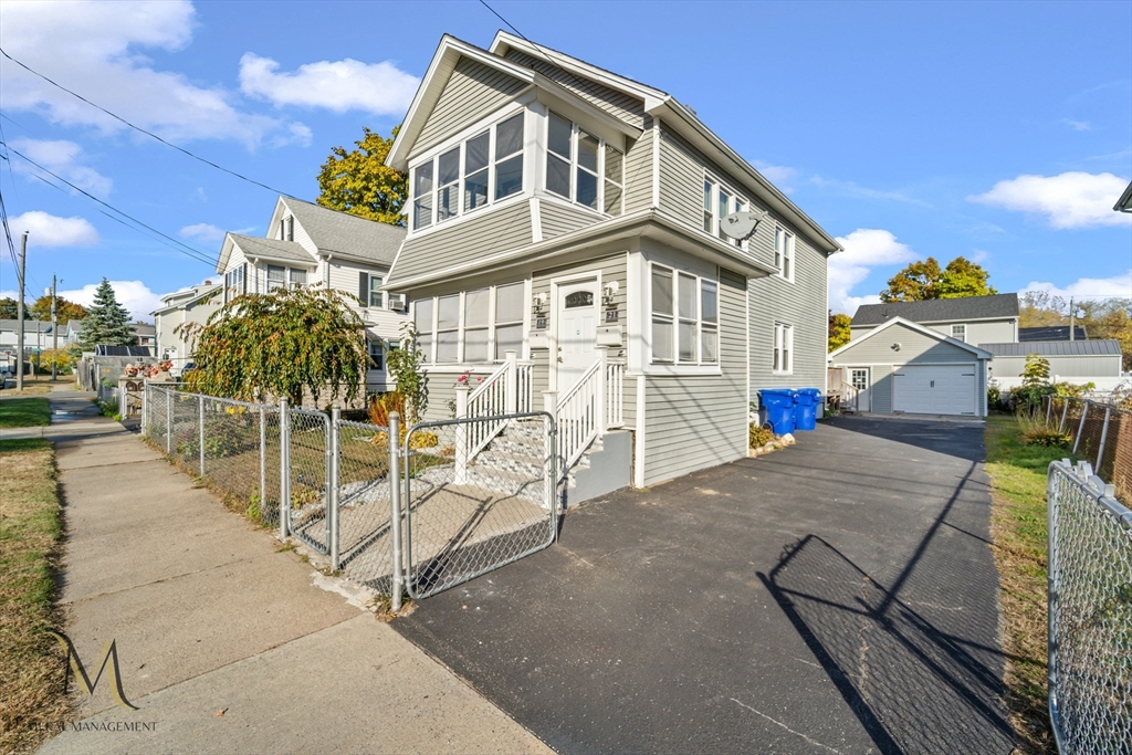 19-21 Daniel Street, Unit 19 Springfield, MA 01151 - Photo 3 of 26 a view of a building with a outdoor space