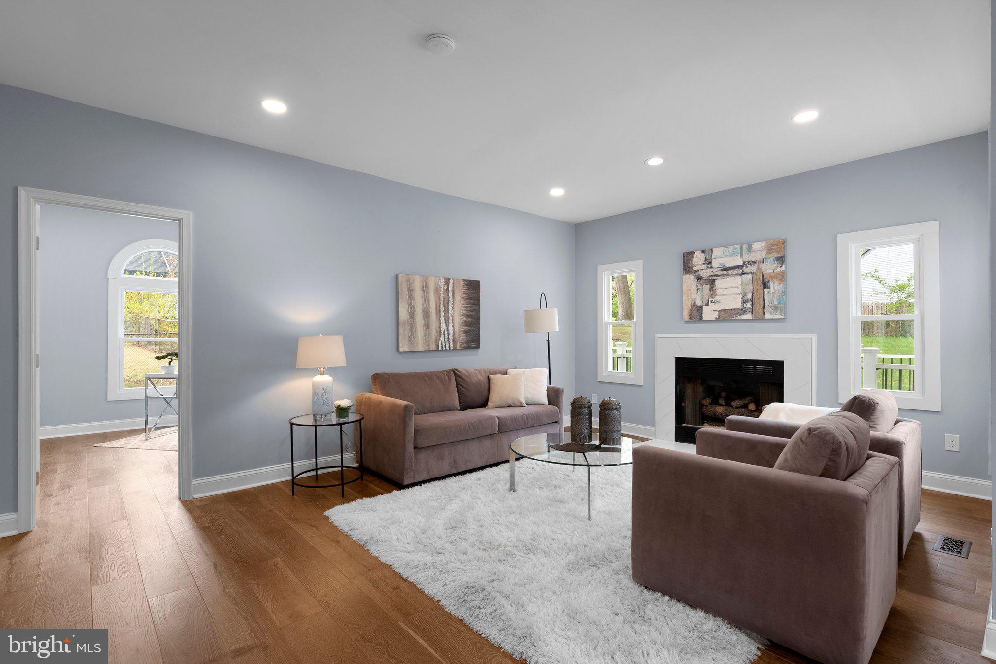 2924 Hunter Road Fairfax, VA 22031 - Photo 12 of 79 a living room with furniture and a fireplace
