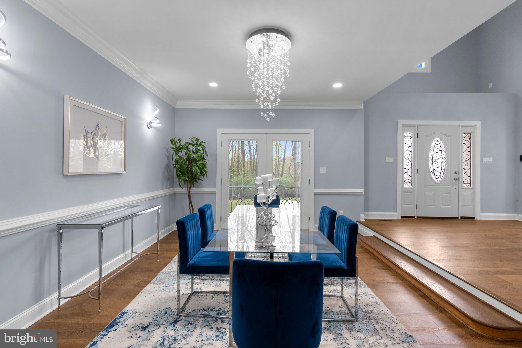 2924 Hunter Road Fairfax, VA 22031 - Photo 17 of 79 a living room with furniture and a chandelier